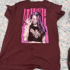 It’s different shades of purple, it’s a T-shirt and a size small.